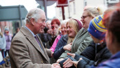 FILE PHOTO: Britain's Prince Charles visits the town of Pontypridd affected by recent floods in Wales