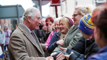 FILE PHOTO: Britain's Prince Charles visits the town of Pontypridd affected by recent floods in Wales