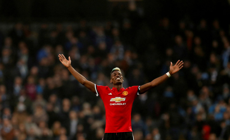 FILE PHOTO: Manchester United midfielder Paul Pogba celebrates after his match-winning display against rivals Manchester City at the Etihad Stadium