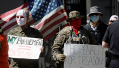 Demonstrators protest against lockdown measures in the wake of the coronavirus disease (COVID-19) outbreak during a demonstration calling for the reopening of the state of Virginia