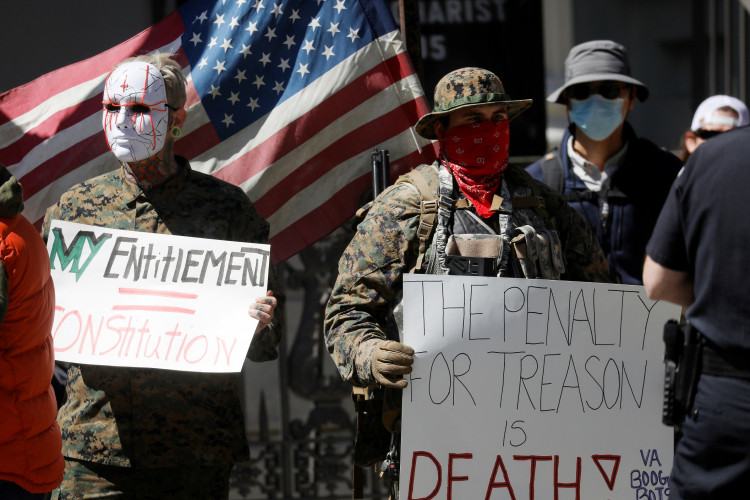Demonstrators protest against lockdown measures in the wake of the coronavirus disease (COVID-19) outbreak during a demonstration calling for the reopening of the state of Virginia