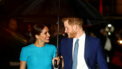 FILE PHOTO: Britain's Prince Harry and his wife Meghan, Duchess of Sussex, arrive at the Endeavour Fund Awards in London