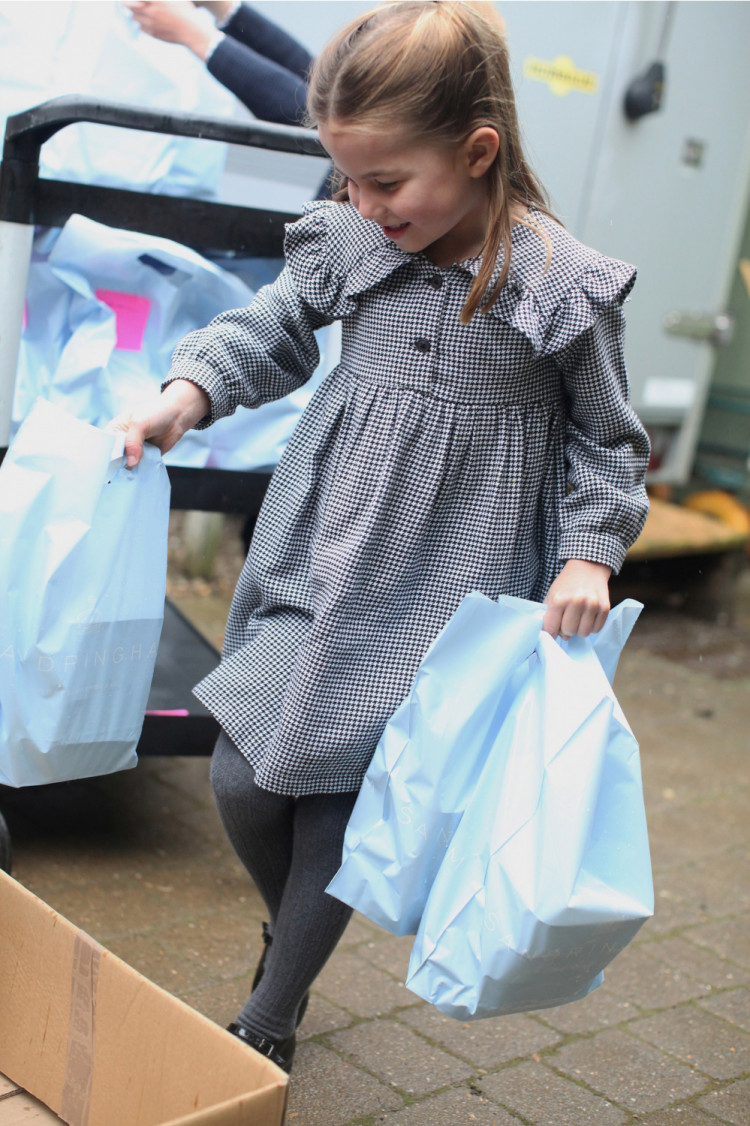 Princess Charlotte, who celebrates her fifth birthday Saturday, taken in April by her mother, the Duchess of Cambridge, on the Sandringham Estate, where the family helped to pack up and deliver food packages for isolated pensioners in the local area