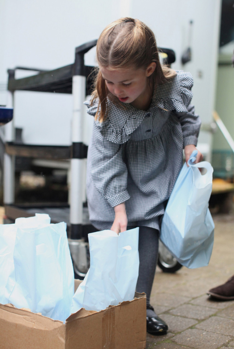 Princess Charlotte, who celebrates her fifth birthday Saturday, taken in April by her mother, the Duchess of Cambridge, on the Sandringham Estate, where the family helped to pack up and deliver food packages for isolated pensioners