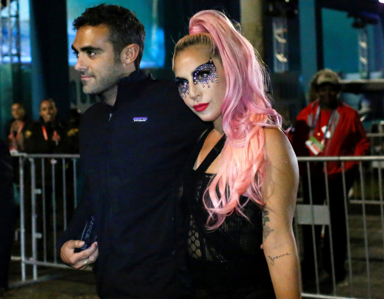FILE PHOTO: Lady Gaga leaves Hard Rock Stadium in Miami Gardens, Florida after the NFL Super Bowl game between the Kansas City Chiefs and San Francisco 49ers, February 2, 2020. REUTERS/Marco Bello/File Photo