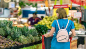 A woman buying her groceries.