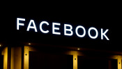 Logo of Facebook is seen in Davos