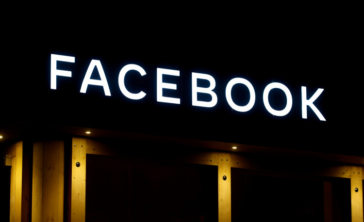 Logo of Facebook is seen in Davos