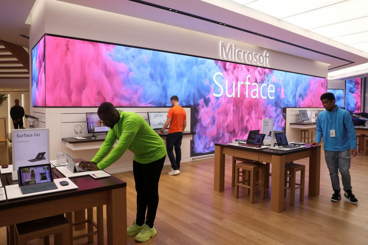 Employees work at Microsoft's new Oxford Circus store ahead of its opening in London