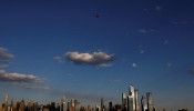 A JetBlue A320 aircraft conducts a flyover salute of New York City to honor frontline healthcare workers during the outbreak of the coronavirus disease (COVID-19), as seen from Weehawken, New Jersey