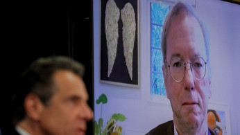New York Governor Andrew Cuomo introduces former Google CEO Eric Schmidt at a daily briefing at North Shore University Hospital, during the outbreak of the coronavirus disease (COVID-19) in Manhasset, New York
