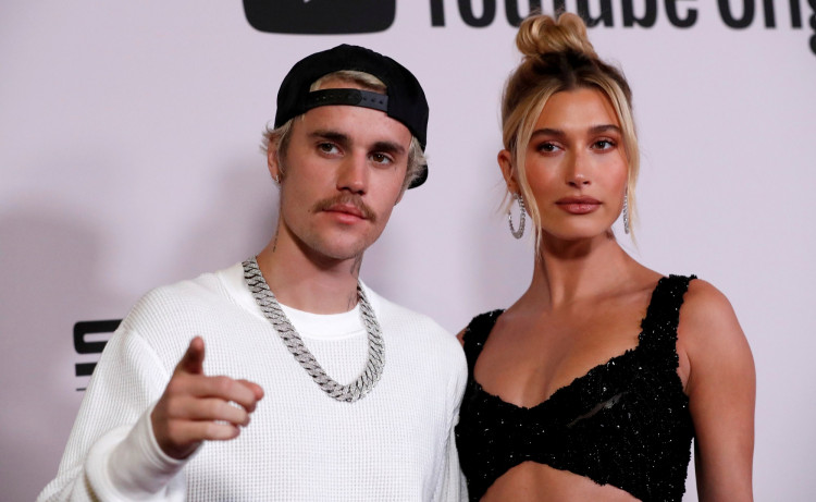 FILE PHOTO: Singer Bieber and his wife Hailey Baldwin pose at the premiere for the documentary television series "Justin Bieber: Seasons" in Los Angeles