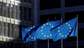  European Union flags fly outside the European Commission headquarters in Brussels, Belgium.