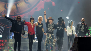 Guns N' Roses mocks Donald Trump in its 'Live N' Let Die' shirt/ Photo by Raph_PH/Wikimedia Commons