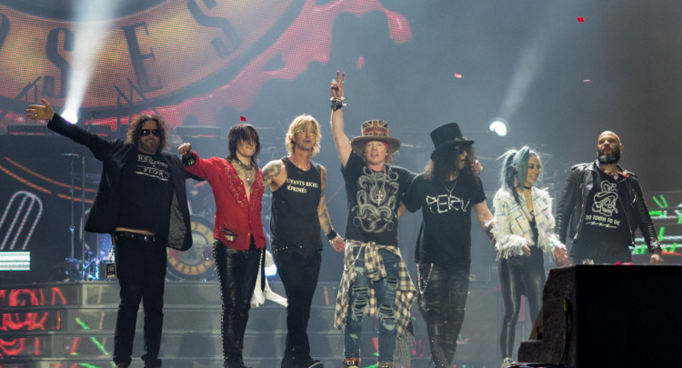 Guns N' Roses mocks Donald Trump in its 'Live N' Let Die' shirt/ Photo by Raph_PH/Wikimedia Commons