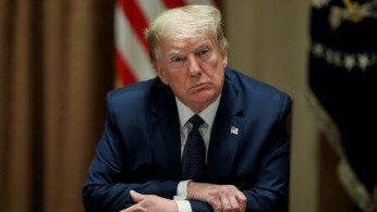 FILE PHOTO: U.S. President Donald Trump holds meeting on economic 