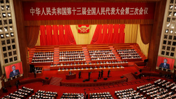 Chinese Premier Li Keqiang delivers a speech at the opening session of the National People's Congress (NPC) at the Great Hall of the People in Beijing, China May 22, 2020. 