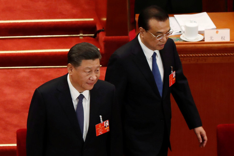 Chinese President Xi Jinping and Premier Li Keqiang arrive at the opening session of NPC in Beijing