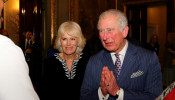 FILE PHOTO: Britain's Prince Charles and Camilla, Duchess of Cornwall attend the Commonwealth Reception at Marlborough House, in London
