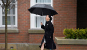 FILE PHOTO: Huawei Chief Financial Officer Meng Wanzhou leaves her home to attend her extradition hearing in Vancouver