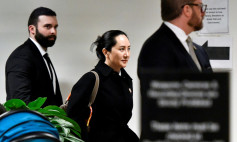 FILE PHOTO: Huawei Chief Financial Officer Meng Wanzhou leaves B.C. Supreme Court following her extradition hearing in Vancouver