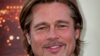 Brad Pitt allegedly flirting with Aussie reporter Renee Bragh. Photo by Toglenn/Wikimedia Commons