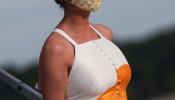 Ivanka Trump wears a protective face mask as she deplanes from Air Force One returning to Washington with her father U.S. President Donald Trump 