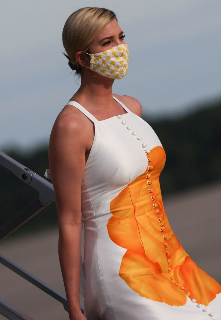 Ivanka Trump wears a protective face mask as she deplanes from Air Force One returning to Washington with her father U.S. President Donald Trump 