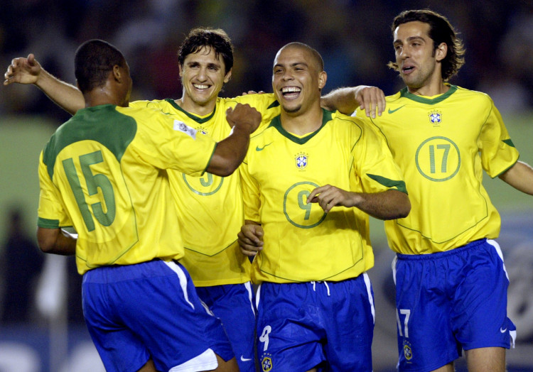 FILE PHOTO: Brazil's Ronaldo celebrates with team mates after scoring his third goal against Argentina