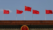 Chinese flags flutter at the Great Hall of the People in Beijing