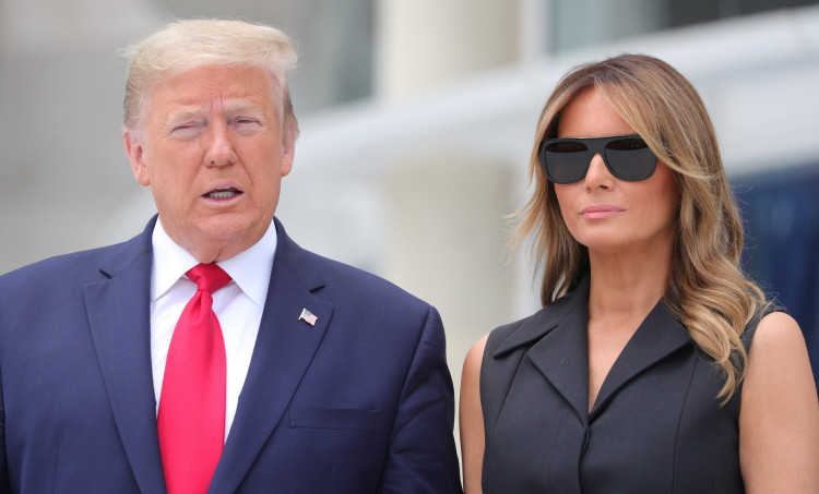 U.S. President Donald Trump and first lady Melania Trump pose during a visit to the Saint John Paul II National Shrine in Washington, U.S., June 2, 2020. REUTERS/Tom Brenner