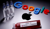 A test tube with fake blood and COVID-19 label and a 3D printed Google logo