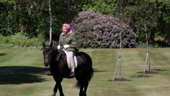 Britain's Queen Elizabeth II rides Balmoral Fern, a 14-year-old Fell pony, in Windsor Home Park