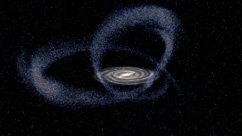 The star formation triggered by the Sagittarius dwarf galaxy in its current approximation to the Milky Way is seen in an illustratio