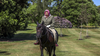 Britain's Queen Elizabeth II rides Balmoral Fern, a 14-year-old Fell pony, in Windsor Home Park