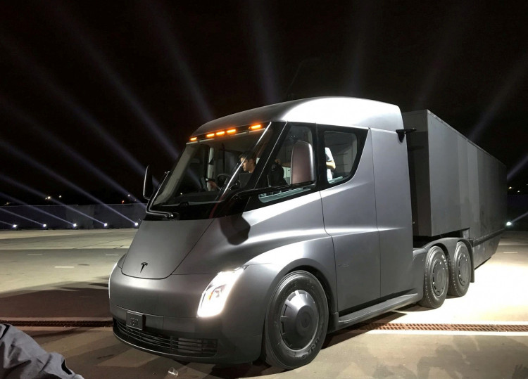 tesla stock prices hit record high amid announcement of accelerated semi production