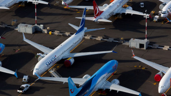 Boeing 737 Max aircraft are parked in a parking lot at Boeing Field in this aerial photo over Seattle