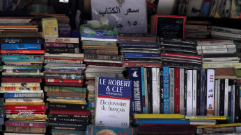 Books for sale are displayed at a bookstand on a street for 15 Egyptian Pounds (0.93 $) each, amid concerns over the coronavirus disease (COVID-19) in central Cairo