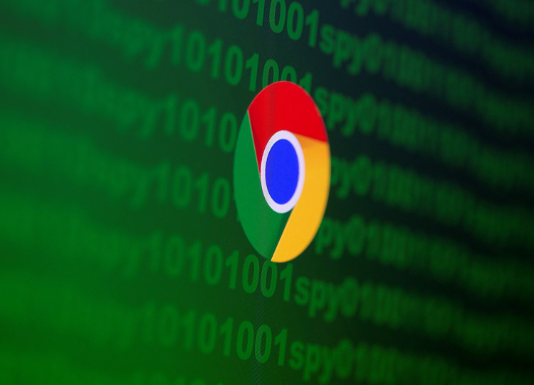 Google Chrome logo is seen near cyber code and words "spy" in this illustration picture