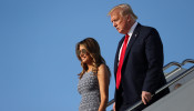 U.S. President Donald Trump and first lady Melania Trump deplane from Air Force One as they return to Washington after travel to the Kennedy Space Center in Florida at Joint Base Andrews, Maryland, U.S., May 27, 2020. REUTERS/Jonathan Ernst
