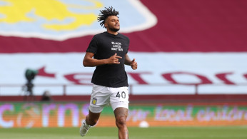 Aston Villa's Tyrone Mings during the warm up before the match as play resumes behind closed doors following the outbreak of the coronavirus disease (COVID-19)