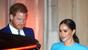 FILE PHOTO: Britain's Prince Harry and his wife Meghan, Duchess of Sussex, leave after attending the Endeavour Fund Awards in London