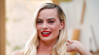 FILE PHOTO: Margot Robbie poses on the red carpet during the Oscars arrivals at the 92nd Academy Awards in Hollywood, Los Angeles, California, U.S., February 9, 2020. REUTERS/Mike Blake/File Photo