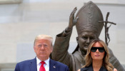 Donald Trump with his wife, Melania, at the Saint John Paul II National Shrine in Washington
