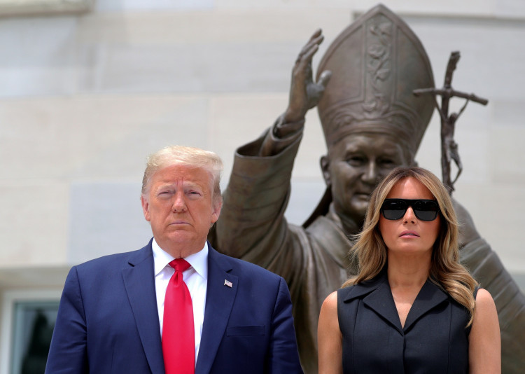 Donald Trump with his wife, Melania, at the Saint John Paul II National Shrine in Washington