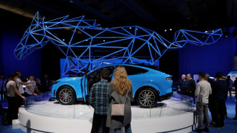 FILE PHOTO: A 2021 Ford Mustang Mach-E SUV is displayed at the Canadian International Auto Show in Toronto