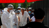 Members of a Chinese medical team dressed in PPE
