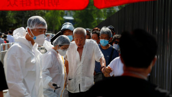 Members of a Chinese medical team dressed in PPE