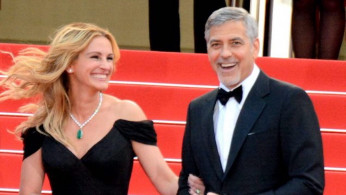 Brad Pitt and George Clooney allegedly clashing over Julia Roberts. Photo by Georges Biard/Wikimedia Commons
