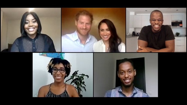 Britain's Prince Harry and Meghan, Duchess of Sussex, speak with young leaders about equal rights